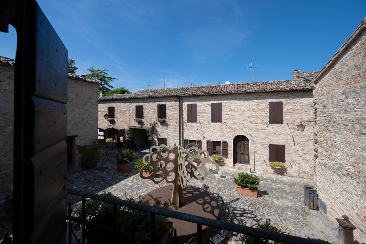 Hotel Palazzo Viviani Castello Di Montegridolfo Exterior foto