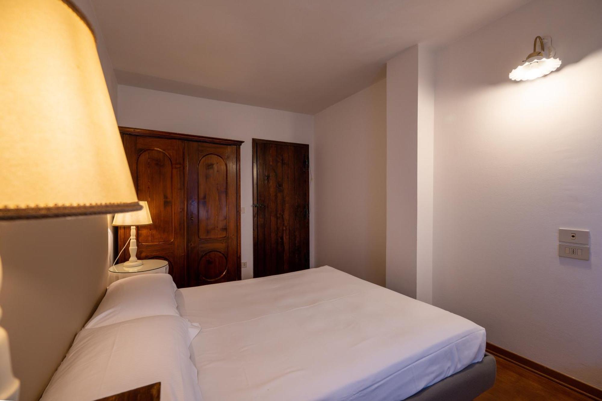 Hotel Palazzo Viviani Castello Di Montegridolfo Zimmer foto